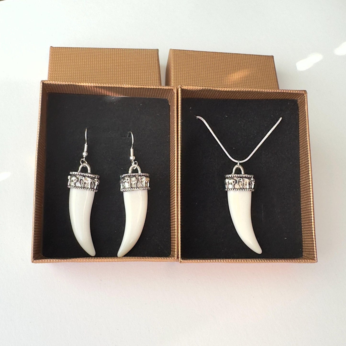 Bone tusk earrings