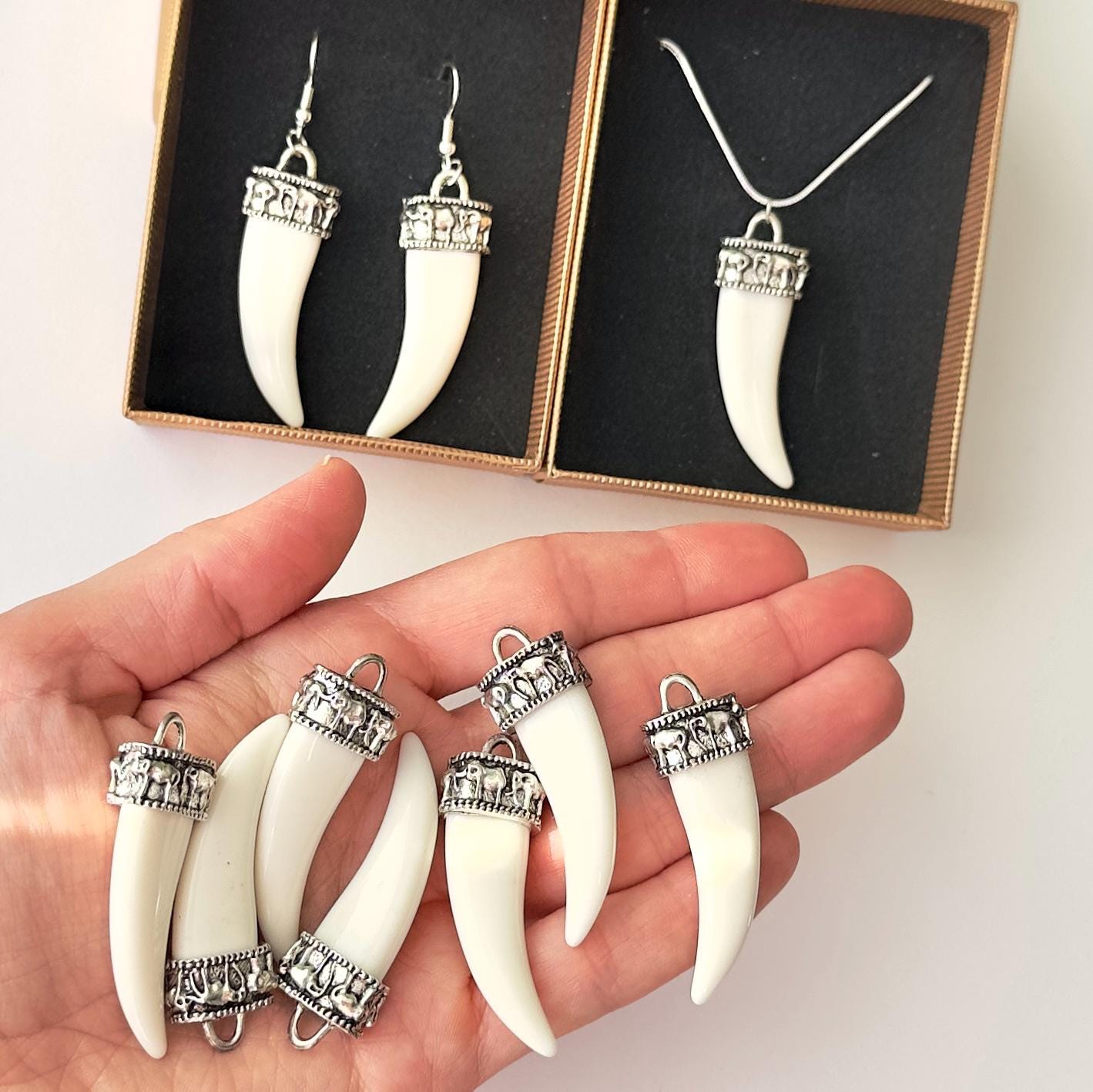 Bone tusk earrings